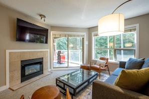 Living area: Access to private patio