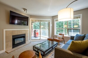 Living area: Access to private patio
