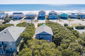 NESTLED IN LIVE OAKS WITH OCEAN VIEWS