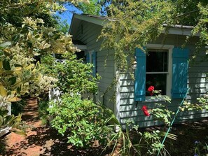 Birdsong Cottage is tucked in the back garden of the historic main house.
