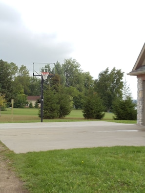 Basketball hoop in the front of the house