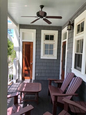 Back porch, perfect for watching family at the pool or relaxing in the shade