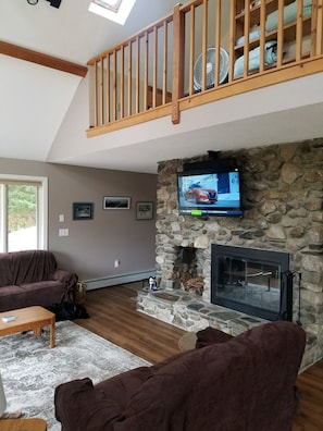 Living room, mounted TV on fireplace 