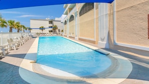 Beachfront pool with Gulf views and plenty of loungers to relax in style