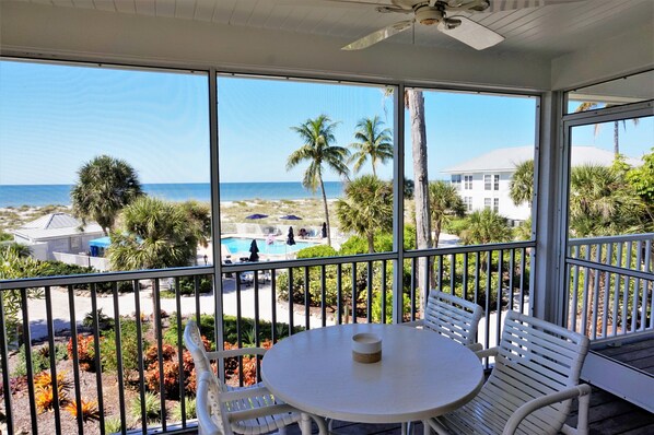 Screened in Lanai with Table and Chairs