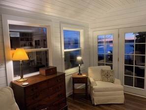 Oceanfront living room at dusk