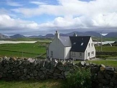 Traditional Croft House with Spectacular Views over Beach and Mountains