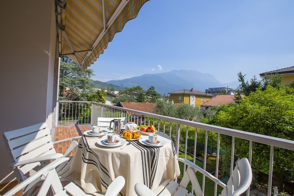 The balcony with view on the mountains for some relaxing or dinner outside