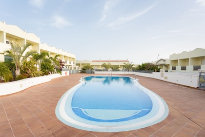 Duplex en la playa Fañabe con piscina climatizada y wifi