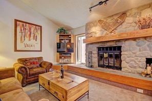 Beautiful stone fireplace. - Sit and relax by a real fire! 