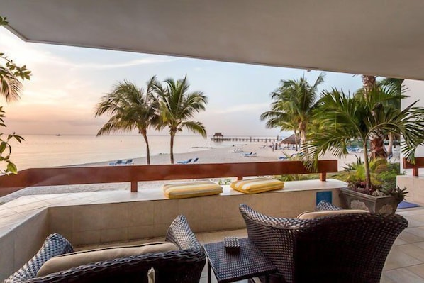 Walk off the terrace and straight on to the beach
