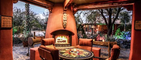 Patio of main house with views of desert landscaping and large casita