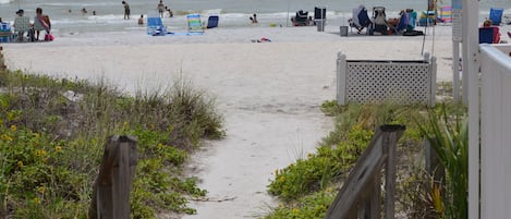 The beach is only a few steps across the street! A beach cart is provided!