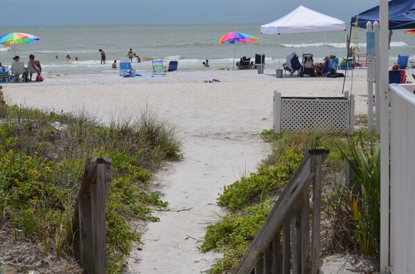 The beach is only a few steps across the street! A beach cart is provided!