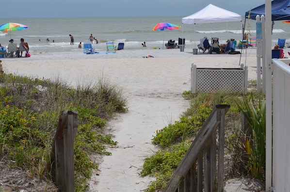 The beach is only a few steps across the street! A beach cart is provided!