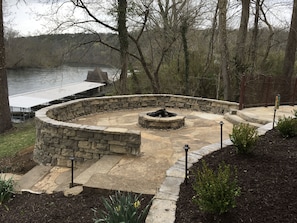 Remote controlled fire pit, stone paths & professionally maintained landscaping 