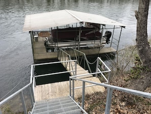 Private dock with seating & parking for your boat
