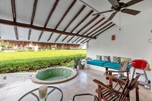 Large terrace with sitting area, and adirondack chairs