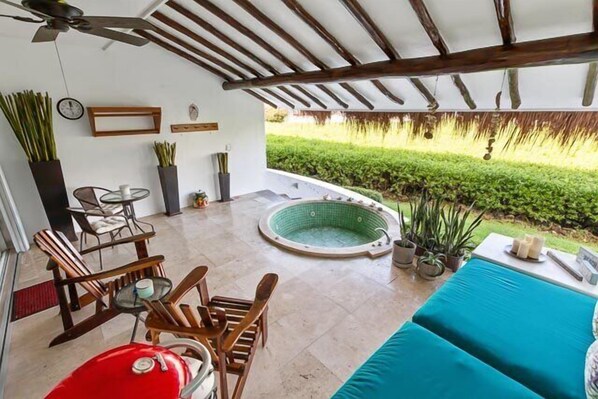 Large terrace with sitting area, and adirondack chairs