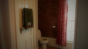 Spacious bathroom with lots of natural light.