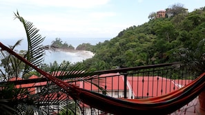 Relax in the hammock and enjoy a view of the beach.