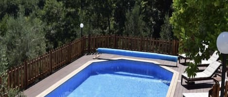 Beautiful private pool with amazing views from the deck . 