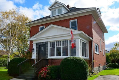 Century old 4 bedroom red brick home located in the Prettiest Town in Canada