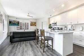 Living Room with Kitchen Area