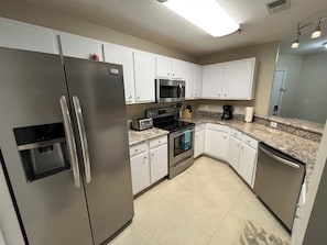 Kitchen with modern appliances & toaster, blender, Keurig & drip coffee maker