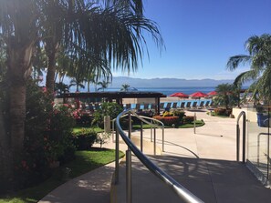3 pools on site. Steps from the beach.