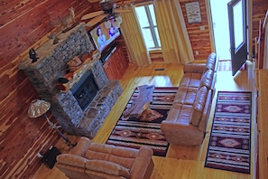 Living area view from upstairs. Gas fireplace to keep you warm and cozy.