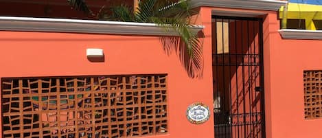 Casa Maare entry. Breeze blocks for light, air and view from the private patio.