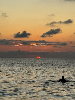 After watching the amazing sunset you can enjoy the warm water into the night