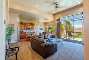 Great room & kitchen leading to outdoor patio for entertaining & relaxation!