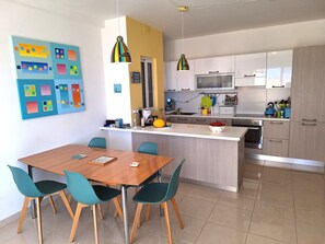 Dining Area and Kitchen with new Table and Chairs