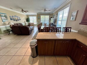 Floor,Flooring,Indoors,Ceiling Fan,Couch