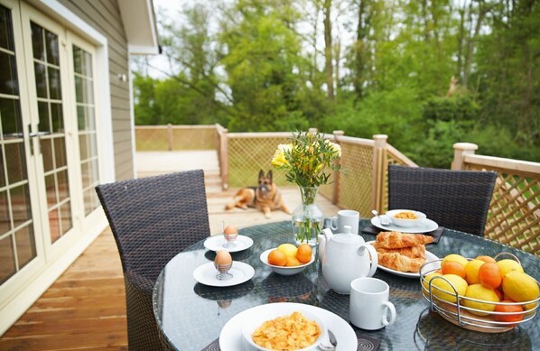 Campion Lodge, Colne Valley: Decked area with garden furniture and hot tub