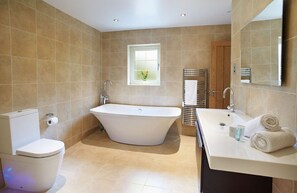 En-suite bathroom with separate shower