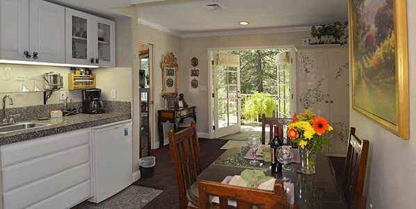 Kitchenette, dining table, 
French door entrance