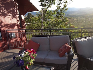 Late afternoon sun on the shared deck.