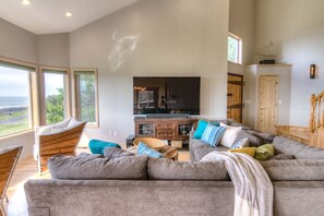 Plenty of room for everyone in this bright and airy living room.