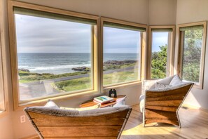 Sit in the sunny window and enjoy nature and the ocean!