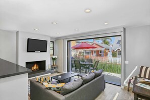 When the patio doors are open and the game is on the TV, everyone can enjoy the best of being outside and not missing the action on the large TV.