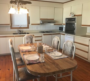 A roomy kitchen for family meals.