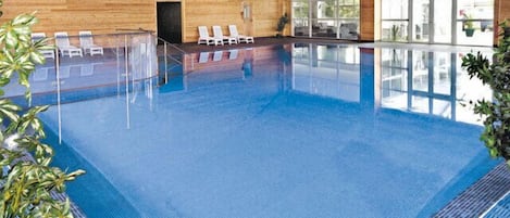 Indoor swimming pool with safe young children's area.