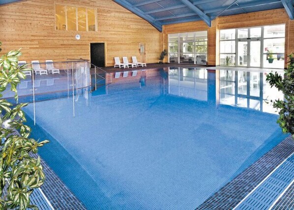 Indoor swimming pool with safe young children's area.