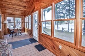 Enjoy a these beautiful lake views from an enclosed proch