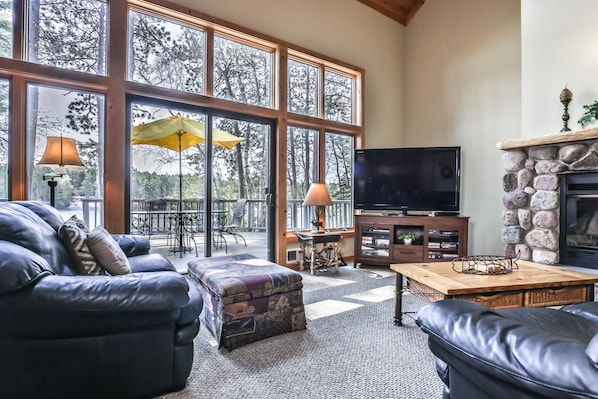 Comfy cozy living area with a beautiful view of the lake