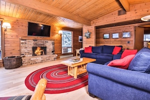 Beautiful living area w/ a wood burning fireplace