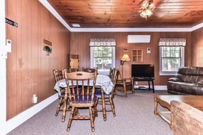 Gather at the dinner table to eat or play board games.